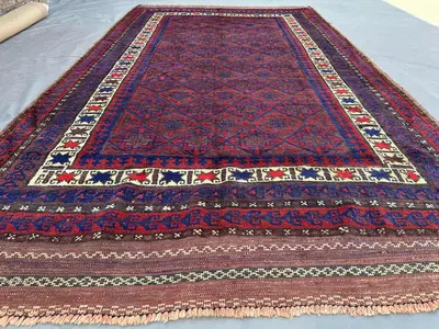 Antique 1920s Afghan Baluch Rug 5'3x9'3 ft Hand-Knotted Nomadic Wool Rug | Tribal Geometric Pattern, Rare Vint