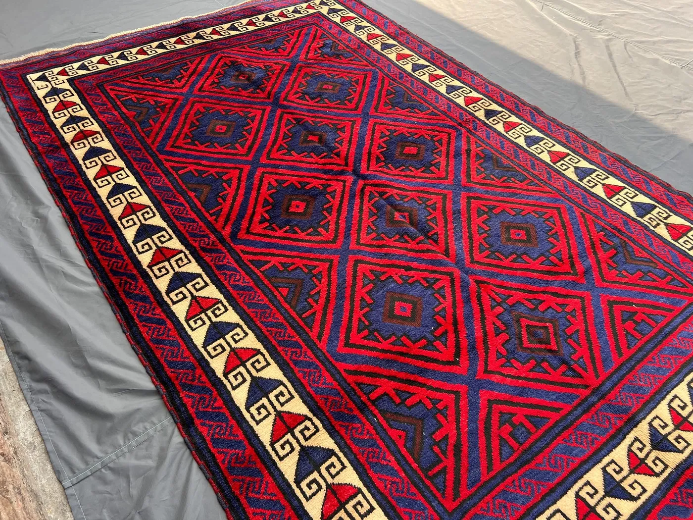 6x9'6 ft Afghan Baluchi Rug | Hand Knotted Tribal Wool Carpet | Red & Navy Geometric Area Rug | Vintage Soft Pile Oriental Floor Decor