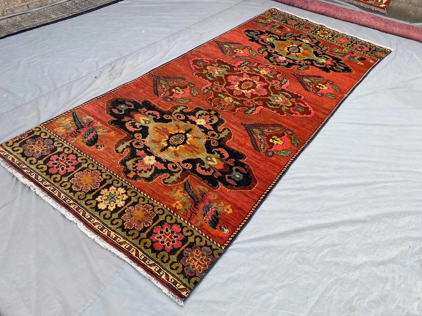 4'9x11'5 Vintage Afghan Wide Runner Rug | Persian-Style Floral Rose (Gol Farang) Medallion Design | Rust Red & Black Wool | Hallway Rug