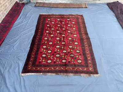 5'2 x 7'9 ft Vintage Afghan Rug | Hand-Knotted Baluchi Rug | Red Floral Geometric Pattern | Soft Wool Oriental