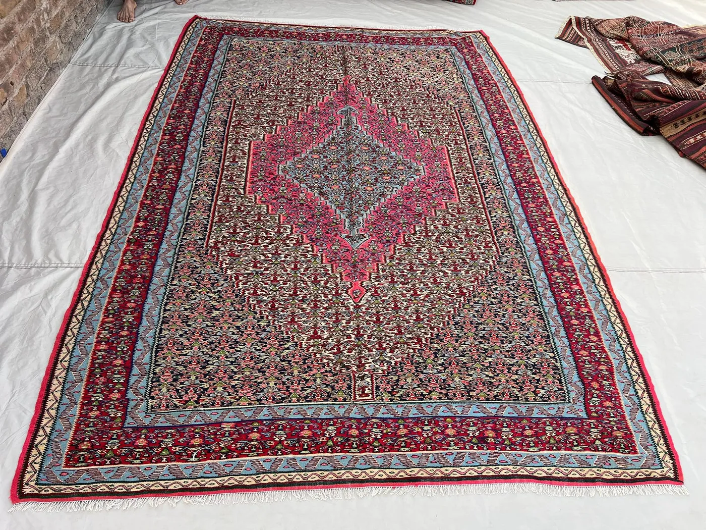 6'8x9'8 ft Vintage Hand-Woven Wool Kilim | Dense Floral All-Over Field & Central Medallion | Deep Red Fuchsia Sky Blue | Living Room